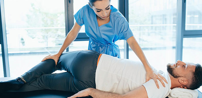 Patient receiving sciatica treatment from Minnetonka chiropractor